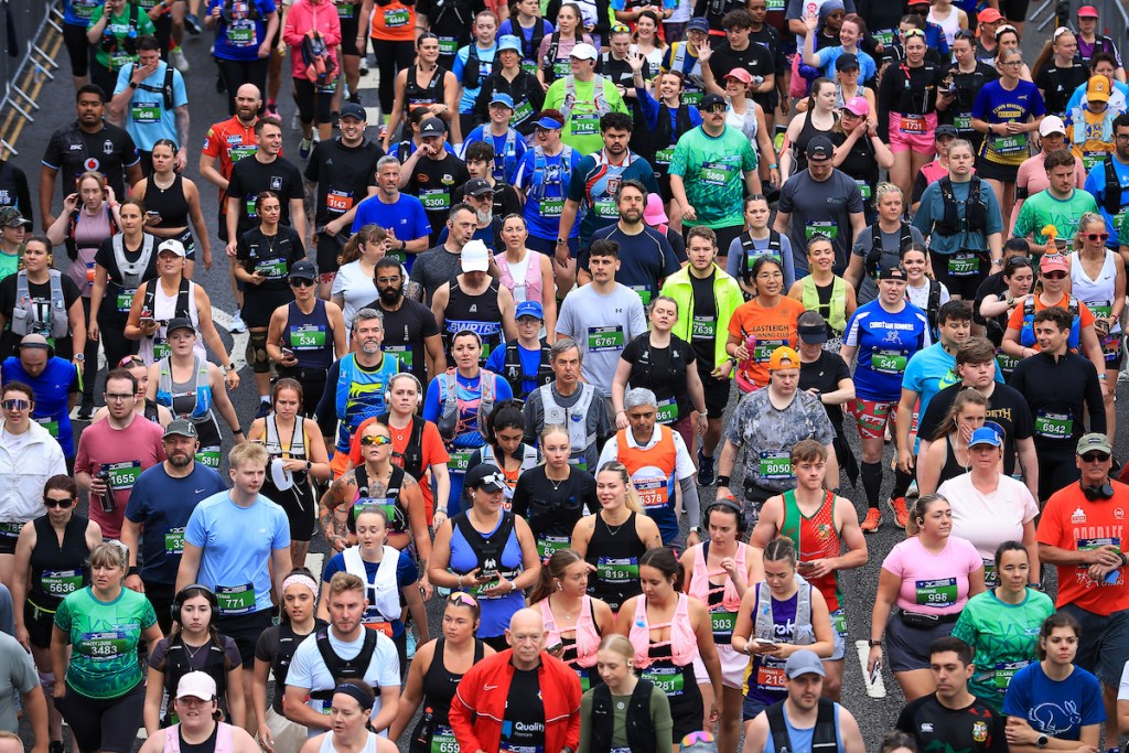 A large crowd of runners packed together during the Swansea Half Marathon.