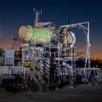 A jet engine mounted on a test rig at dusk, part of the Rolls-Royce and easyJet hydrogen programme.