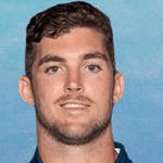 Head-and-shoulders portrait of rugby player Lawson Creighton against a pale blue background.