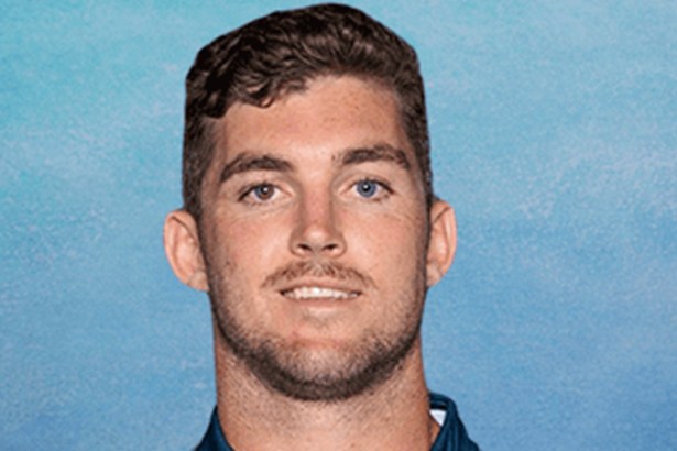 Head-and-shoulders portrait of rugby player Lawson Creighton against a pale blue background.