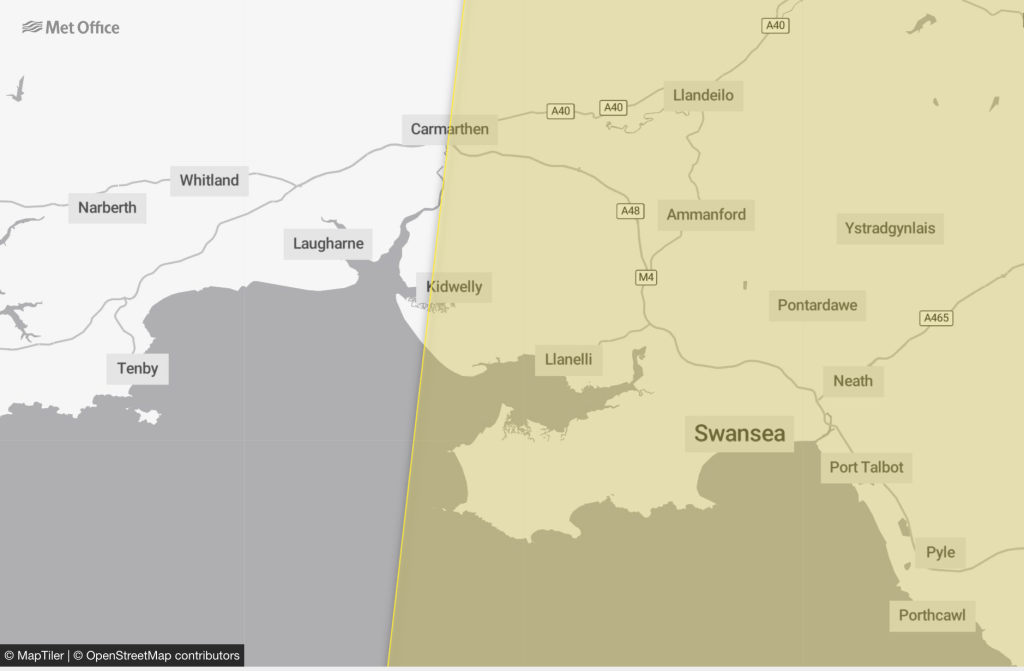 Met Office map showing the yellow thunderstorm warning area covering Swansea, NPT and east Carmarthenshire, with the boundary running through Carmarthen.