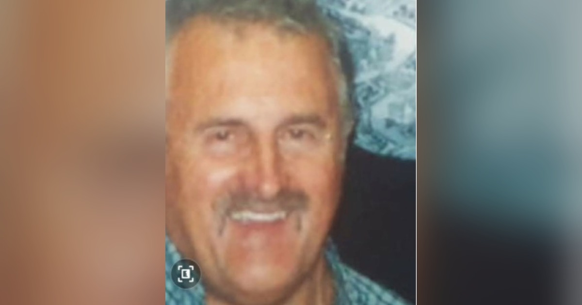 Brian William Bodenham, an 80-year-old man with grey hair and a moustache, smiling.