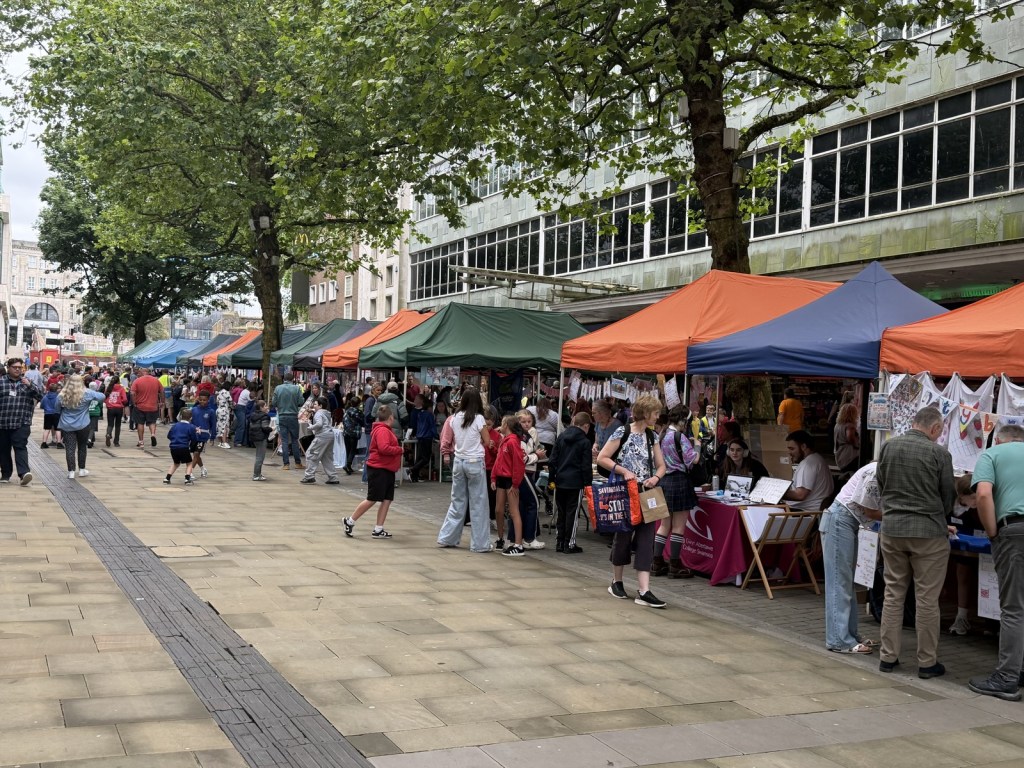 Around 50 schools lined Oxford Street for the annual enterprise market. (Image: Swansea Bay News)