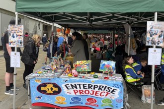 A St Illtyd's Catholic Primary School "Enterprise Project" stall at the schools' market on Oxford Street. (Image: Swansea Bay News)