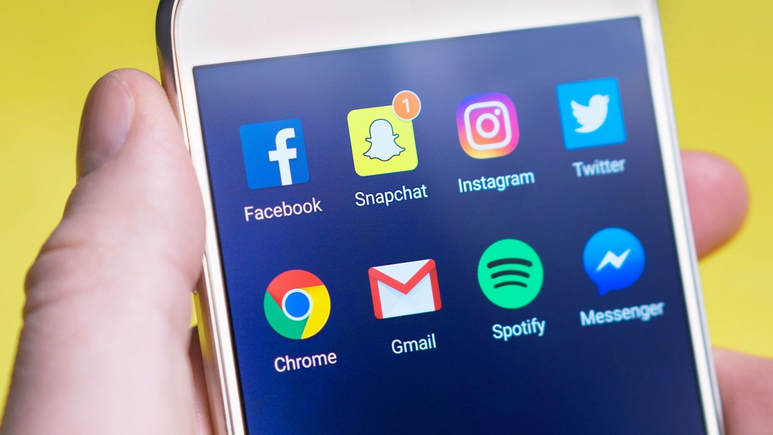 person holding turned on android smartphone