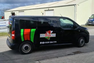 A Windy Corner Coaches taxi