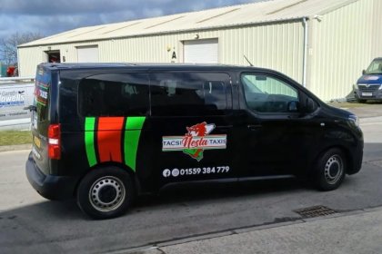 A Windy Corner Coaches taxi