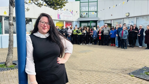 Zoe Murphy smiling outside the Phoenix Centre community building in Townhill