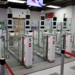 Passengers using the automated eGates at Cardiff Airport's arrivals hall