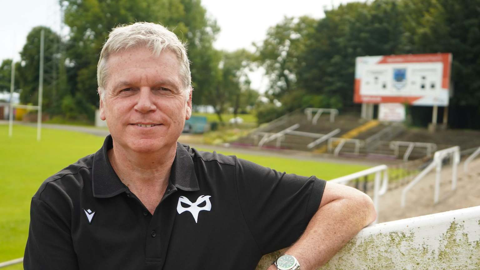 Ospreys chief executive Lance Bradley in an Ospreys polo shirt at St Helen's