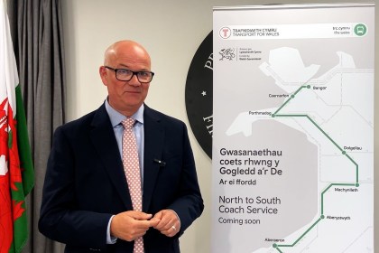Deputy transport minister Mark Hooper with the North to South bus link map
