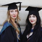 Sisters Sarah Davies and Carys Bristowe-Davies in graduation caps and gowns