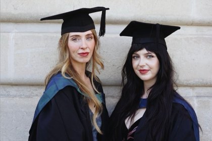 Sisters Sarah Davies and Carys Bristowe-Davies in graduation caps and gowns
