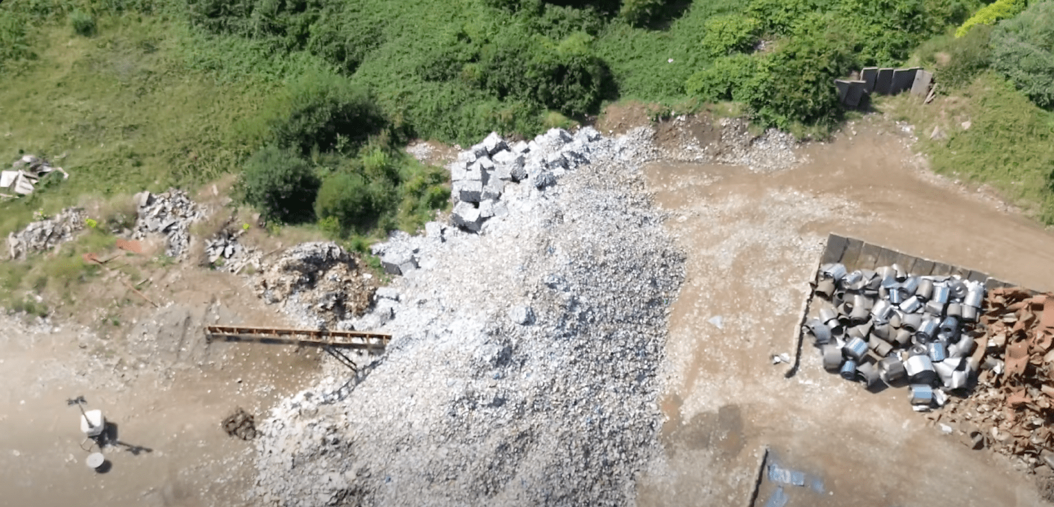 Overhead drone view of waste piles at the AMG Resources site in Llanelli