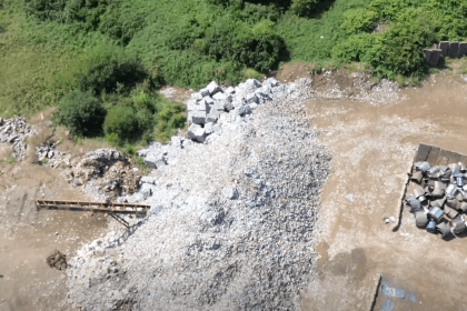 Overhead drone view of waste piles at the AMG Resources site in Llanelli