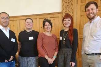Five Swansea University researchers standing together — Dr Yang Liu, Dr Laura Seymour, Dr Maria Cheshire-Allen, Dr Charlotte Jones and Dr Tom Avery.