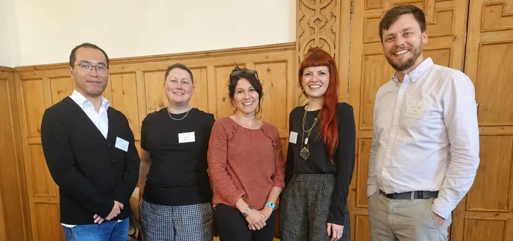 Five Swansea University researchers standing together — Dr Yang Liu, Dr Laura Seymour, Dr Maria Cheshire-Allen, Dr Charlotte Jones and Dr Tom Avery.