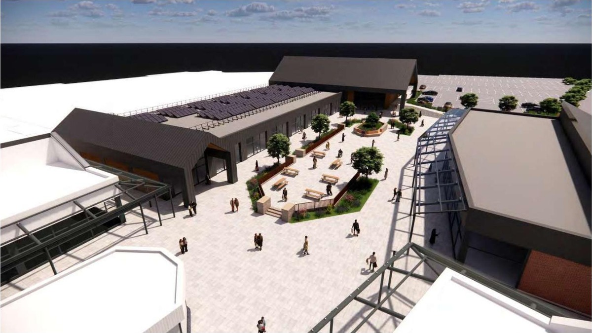 Aerial artist's impression of the proposed extension and public square at Bridgend Designer Outlet with rooftop solar panels