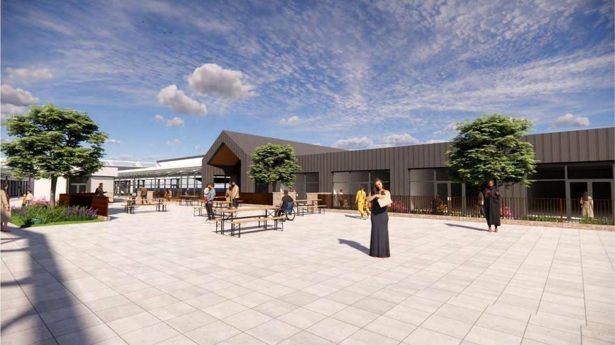Artist's impression of a landscaped public square with picnic benches and trees at Bridgend Designer Outlet