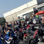 Crowds of bikers and onlookers gathered in a car park for the Ceiran Evans memorial ride-out