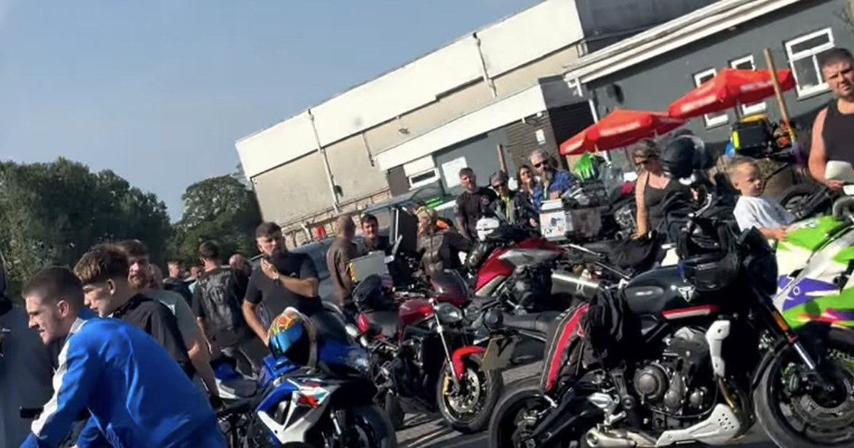 Crowds of bikers and onlookers gathered in a car park for the Ceiran Evans memorial ride-out