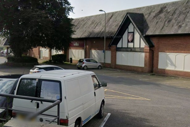 The former Wilko store at Friars Park, Carmarthen, with its mock-Tudor gable and shuttered frontage