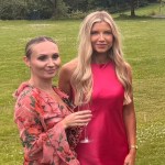 Nurses Kelsey Pirie and Emma Brown in wedding outfits standing on the lawn at Bryngarw House