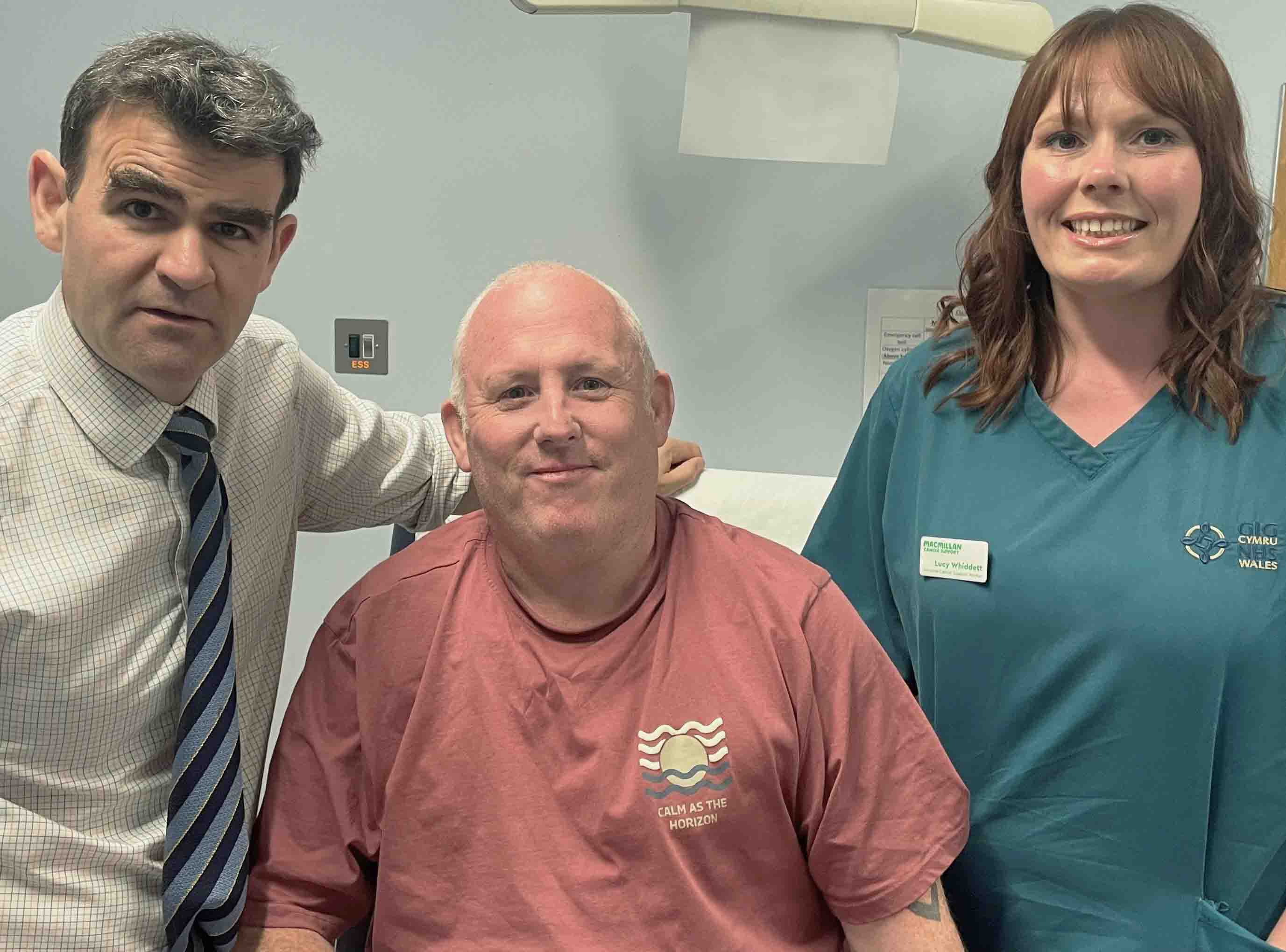 Lee Brain with consultant surgeon Thomas Bragg and sarcoma cancer support worker Lucy Whiddett at Morriston Hospital