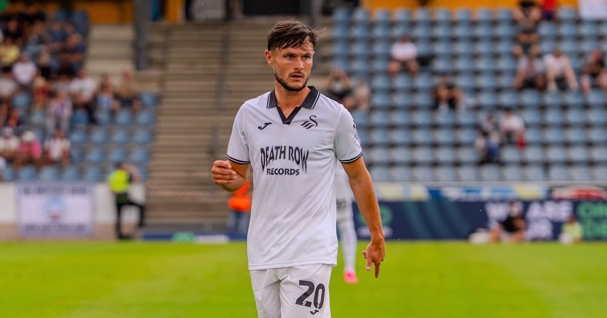 Liam Cullen on the pitch in Swansea City's white kit during the pre-season tour of Austria