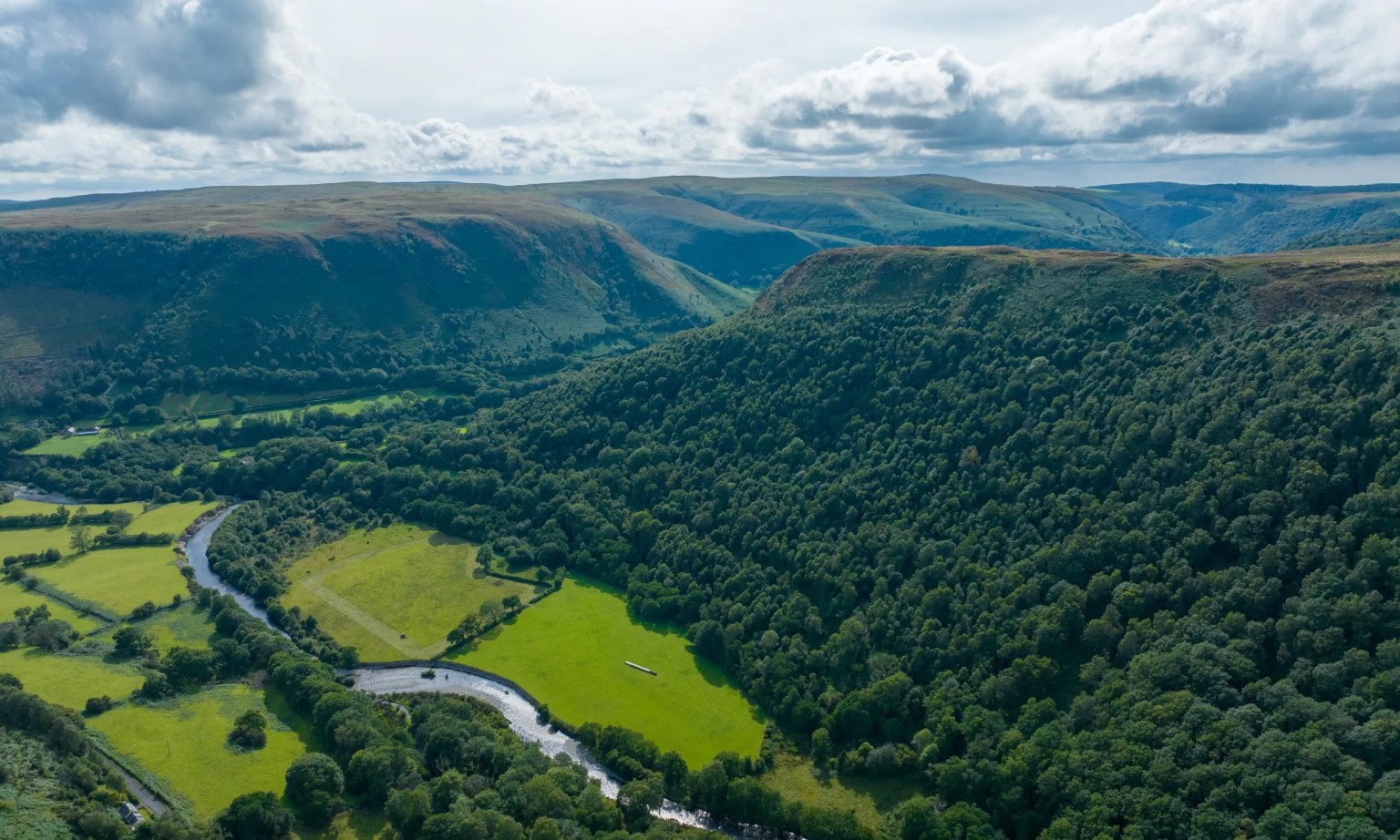 The wooded hillside and upland landscape of Gallt-y-bere in the Elenydd, Carmarthenshire