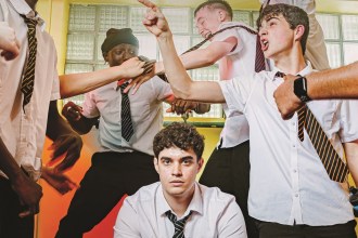 Five actors in school uniform in a changing room scene, one sitting calmly while the others gesture around him. Optional: full poster inline at the end, same credit.