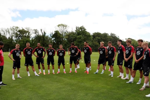 Swansea City's limited-edition black and white Austria tour kit with the Death Row Records logo on the front of the shirt