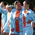Swansea City Women players celebrating a goal during a Genero Adran Premier match