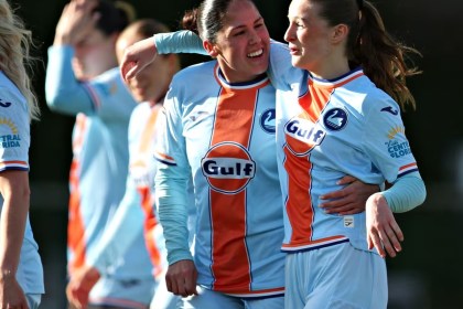 Swansea City Women players celebrating a goal during a Genero Adran Premier match