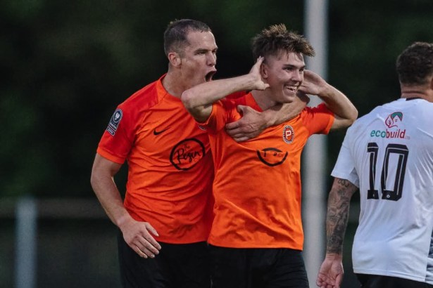 Pure Swansea full-back Dan Ingram celebrating his goal against Pontypridd United