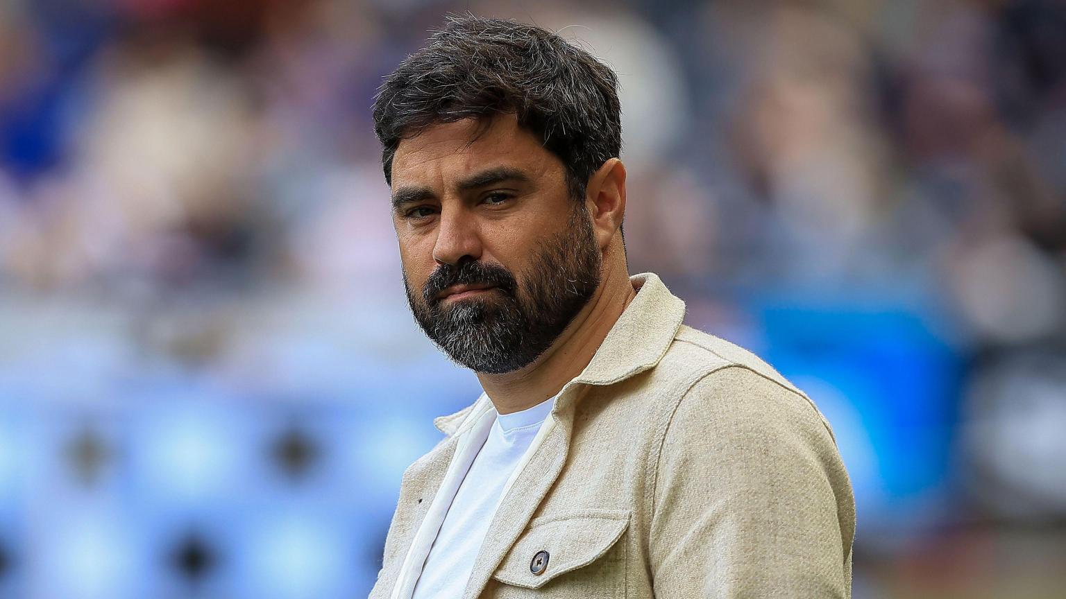 Swansea City head coach Vitor Matos on the touchline during a match