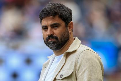 Swansea City head coach Vitor Matos on the touchline during a match