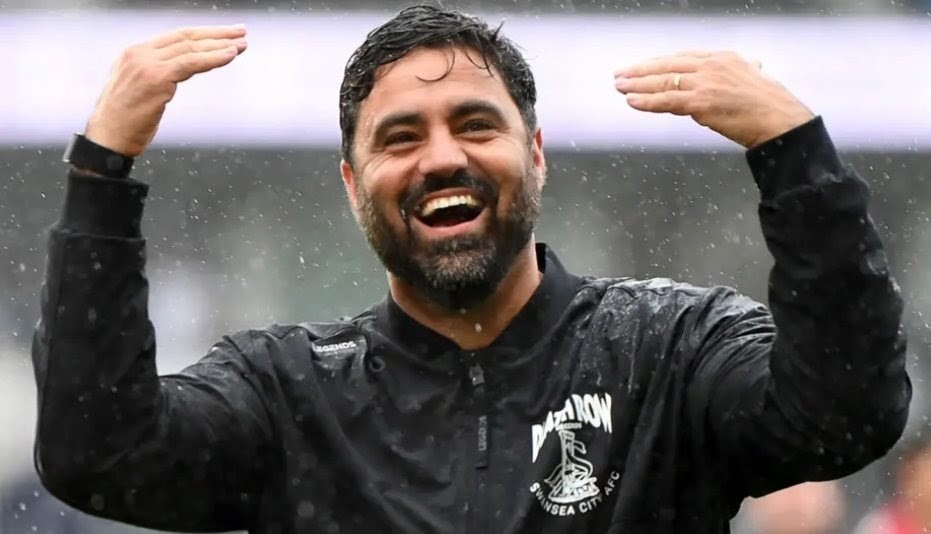 Swansea City head coach Vitor Matos speaking after the game at Pride Park