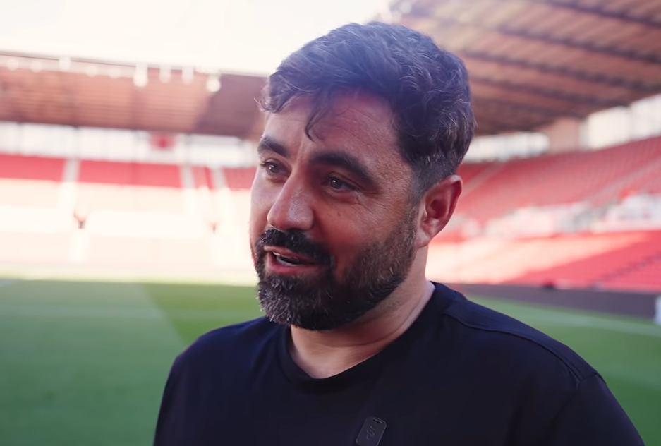 Vitor Matos speaking pitchside at the bet365 Stadium after Swansea City's win