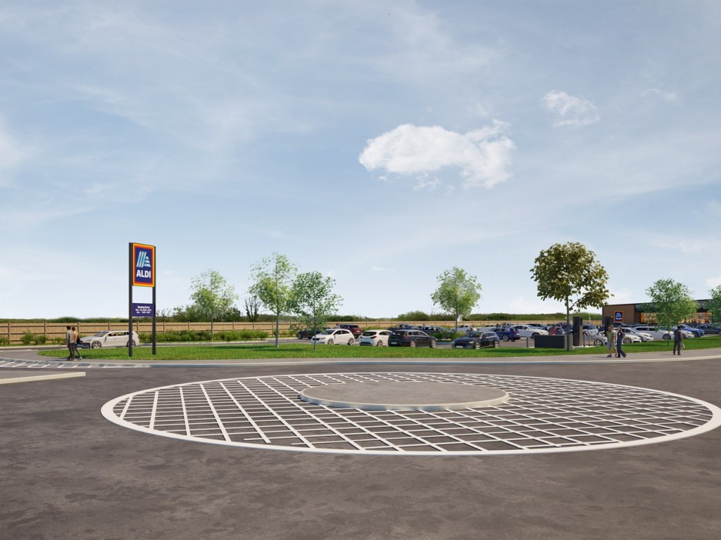 Computer-generated view from the roundabout east of the site, showing an Aldi sign, the car park and the store beyond
