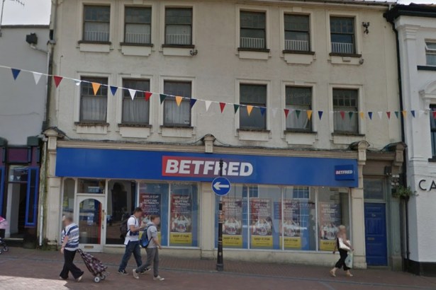 The Betfred betting shop on New Street in Neath with its blue shopfront