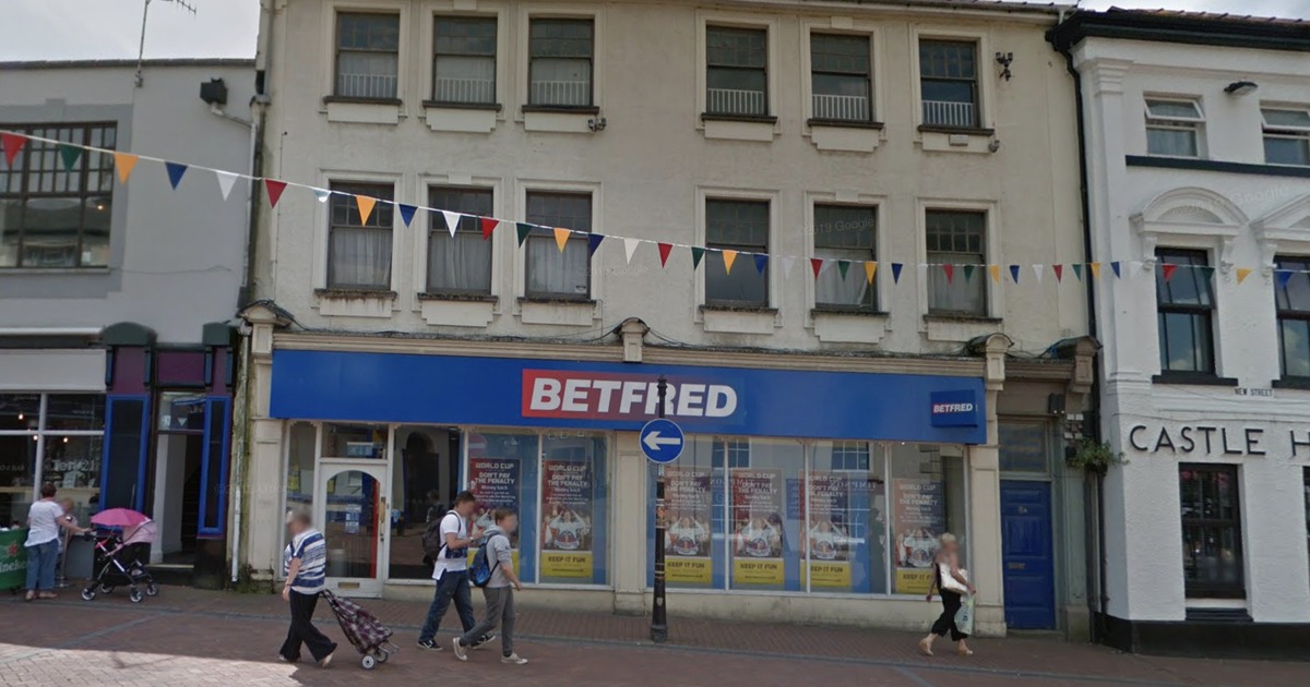 The Betfred betting shop on New Street in Neath with its blue shopfront
