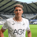 Tiago Parente in a Swansea City home shirt on the pitch at the Swansea.com Stadium