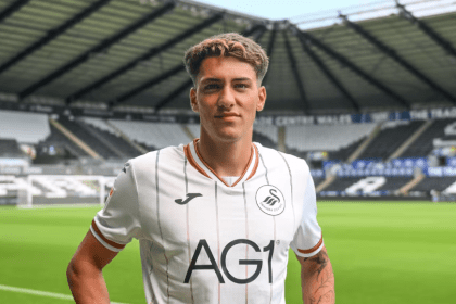 Tiago Parente in a Swansea City home shirt on the pitch at the Swansea.com Stadium
