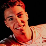 Swansea City new signing Tiago Parente in the new home shirt, with the circular club badge showing the Swansea City AFC lettering