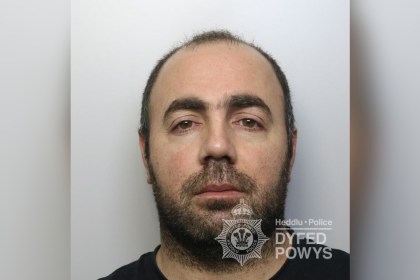 Custody photograph of Isa Ayan issued by Dyfed-Powys Police