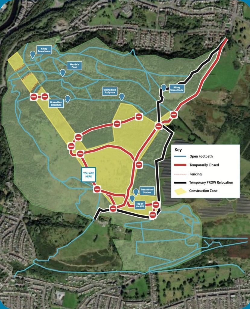 Aerial map of Kilvey Hill showing open footpaths in blue, temporarily closed paths in red, a relocated right of way in black and the construction zone in yellow