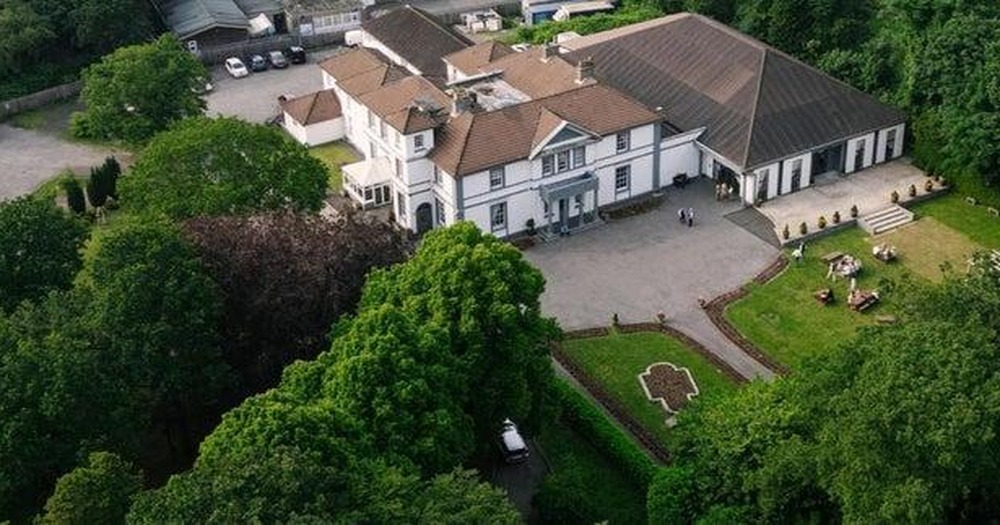 Aerial view of Manor Park Country House in Clydach and its grounds