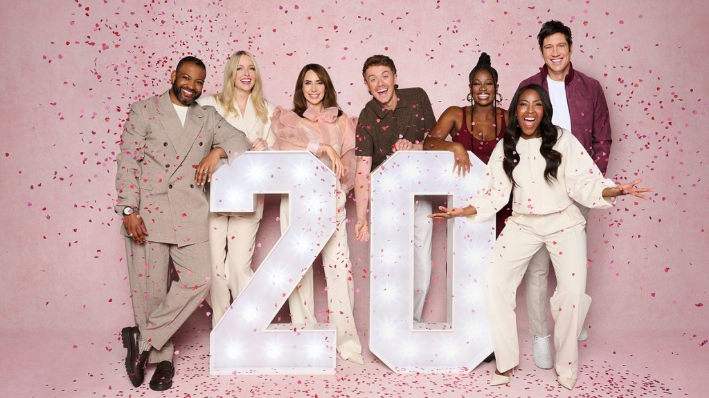 The One Show presenting team standing around large illuminated number 20 letters with confetti falling