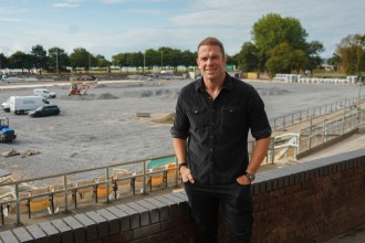 Alun Wyn Jones standing at St Helen's with the stripped pitch and construction work behind him